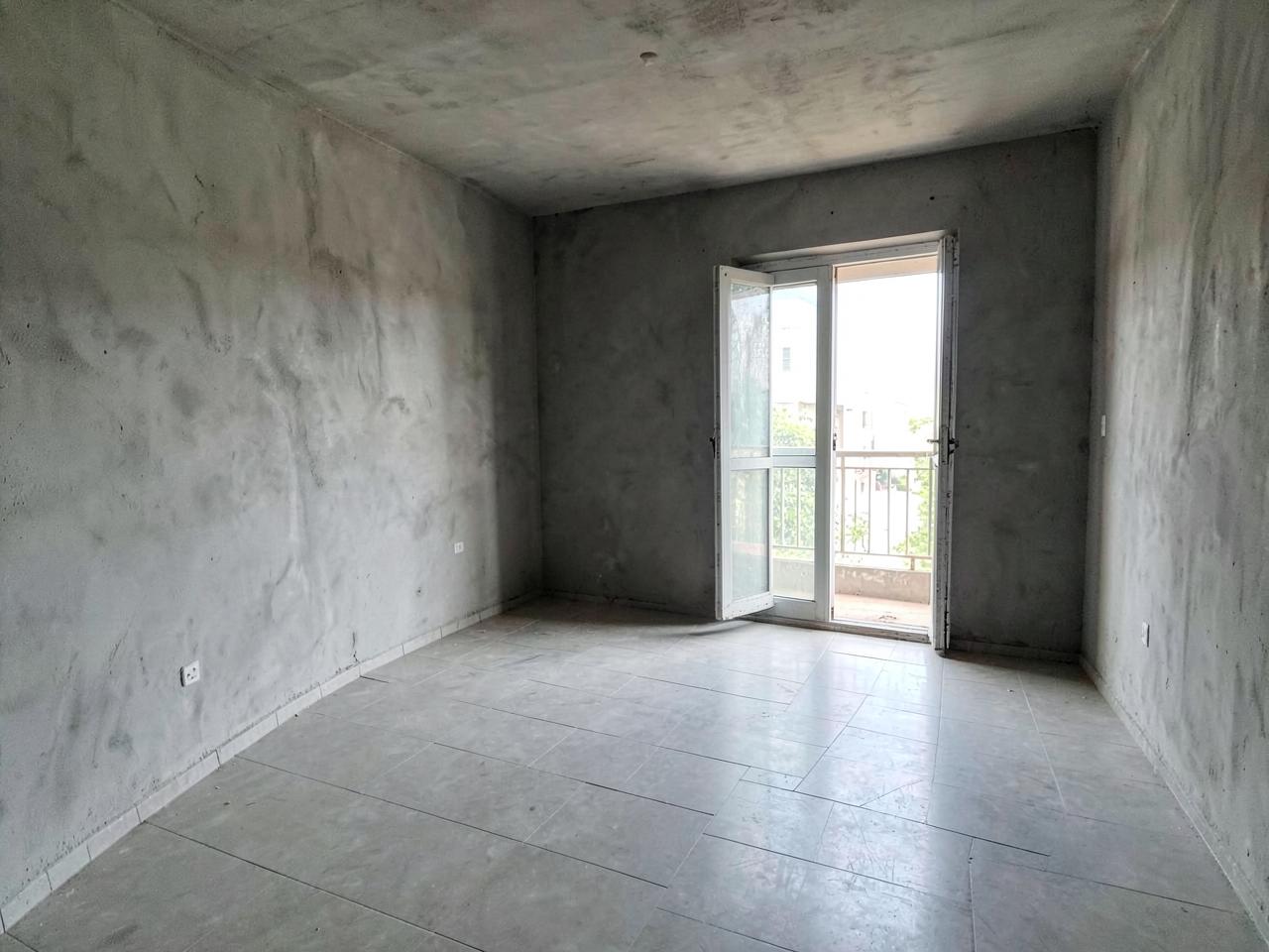 Bare unfurnished apartment living room before interior work